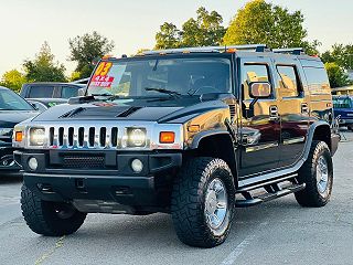 2003 Hummer H2  VIN: 5GRGN23UX3H141995