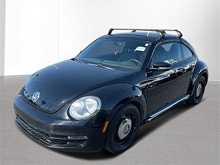 2013 Volkswagen Beetle  VIN: 3VWJP7AT3DM661166