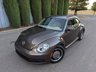 2014 Volkswagen Beetle  VIN: 3VWJP7AT3EM629884